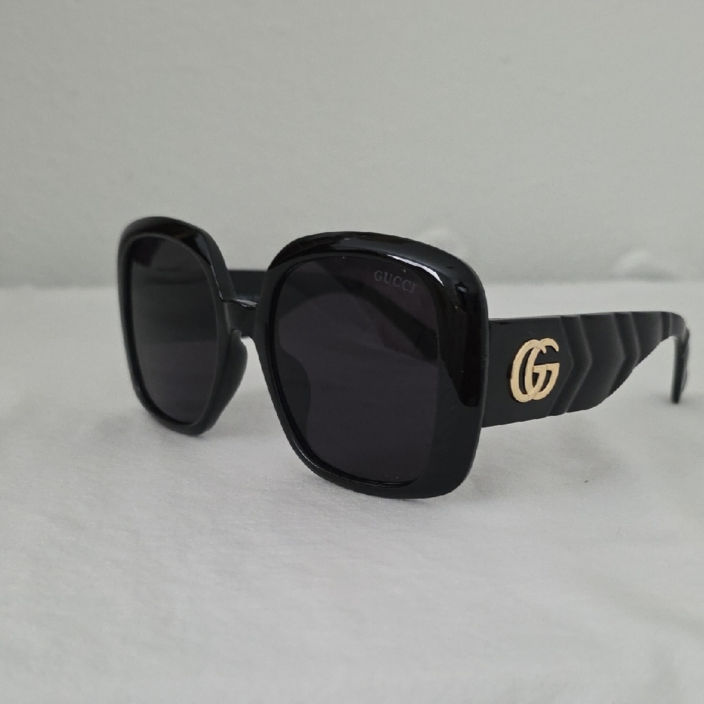 Gucci Black and Gold Sunglasses
